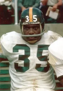 Color photo of Pittsburgh Steeler John Henry Johnson, on the sideline.,