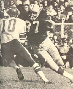 Packers Willie Davis gets to Viking QB Fran Tarkenton